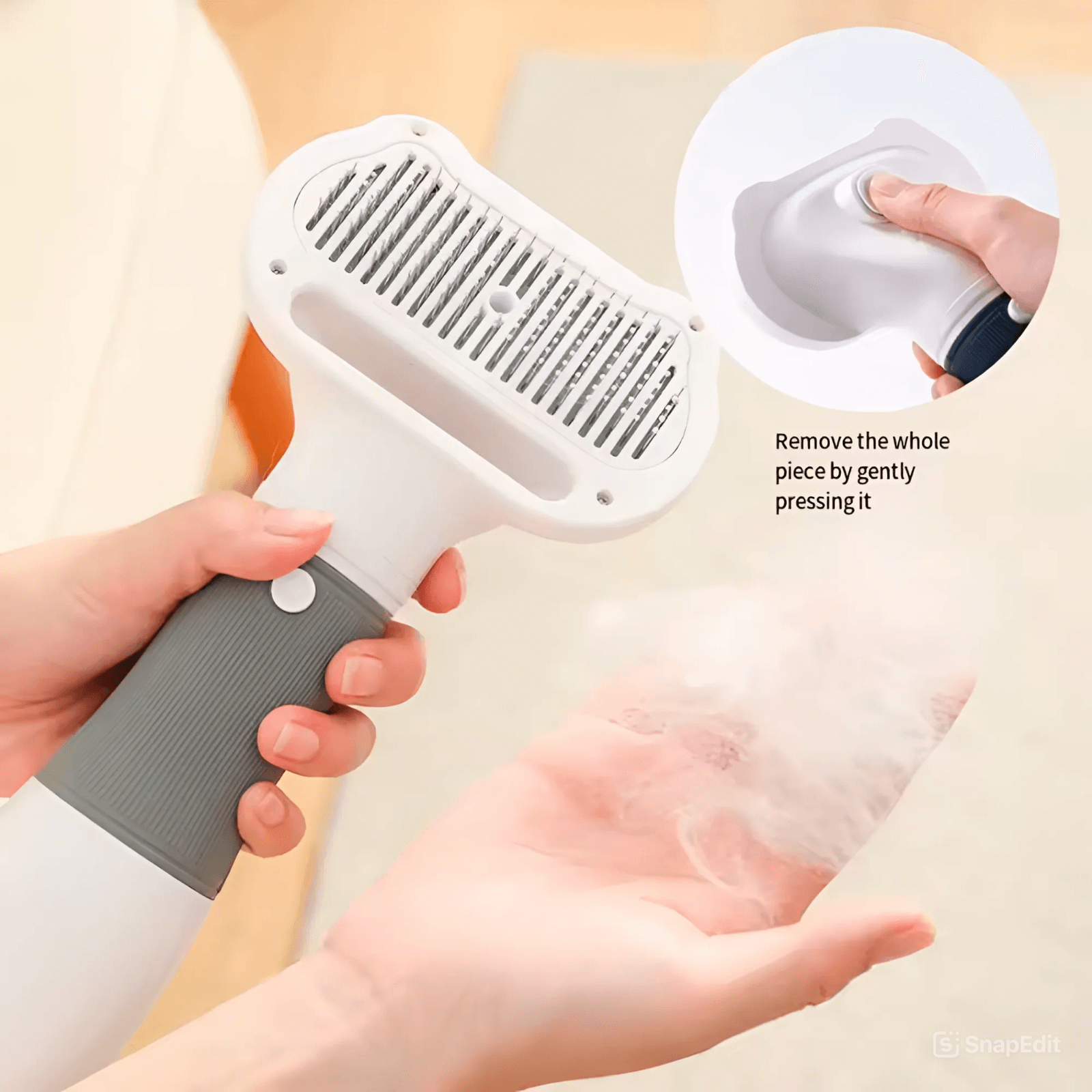 User holding a 3-in-1 dog hair dryer and grooming comb, demonstrating the removable piece feature.