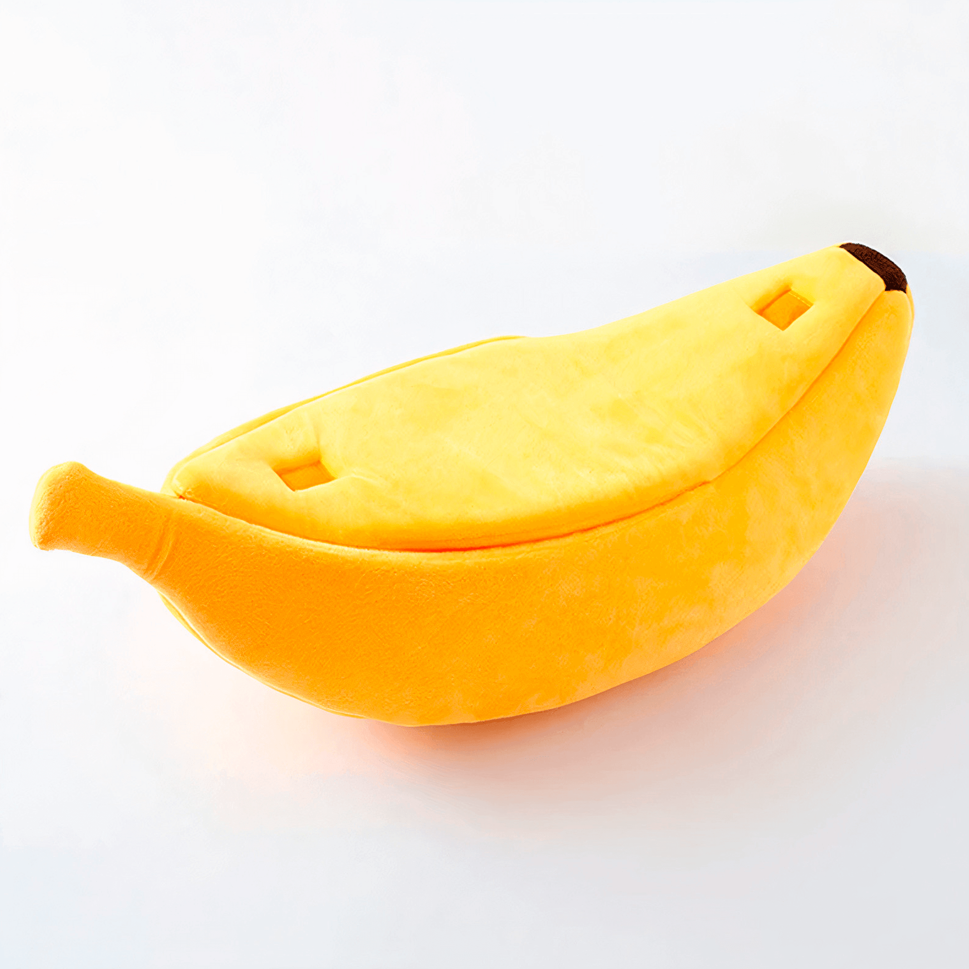 Banana-shaped cat bed made from soft plush fabric